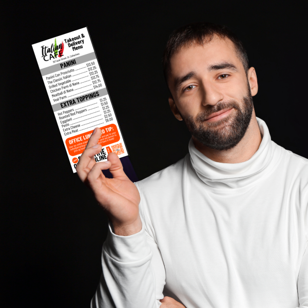 File:Person holding Italian Cafe takeout menu.png